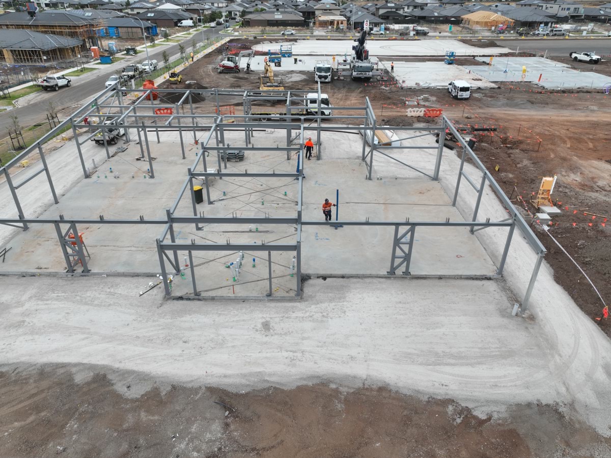 Tarneit North Primary School kindergarten (interim name) - construction photo of site progress in March 2023 - shot showing steel framework of a school building