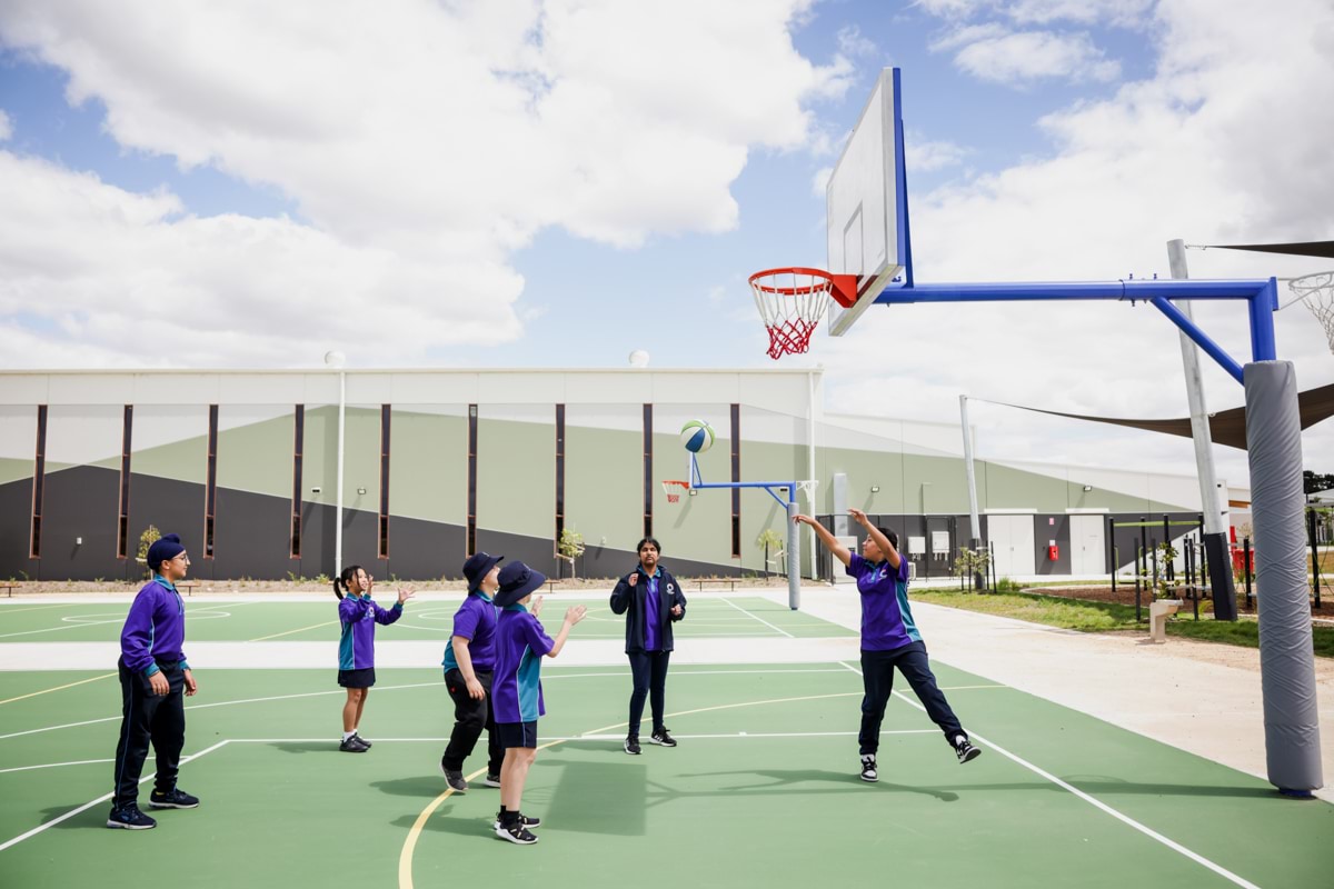 Banum Warrik Primary School – official opening, students playing on the outdoor court