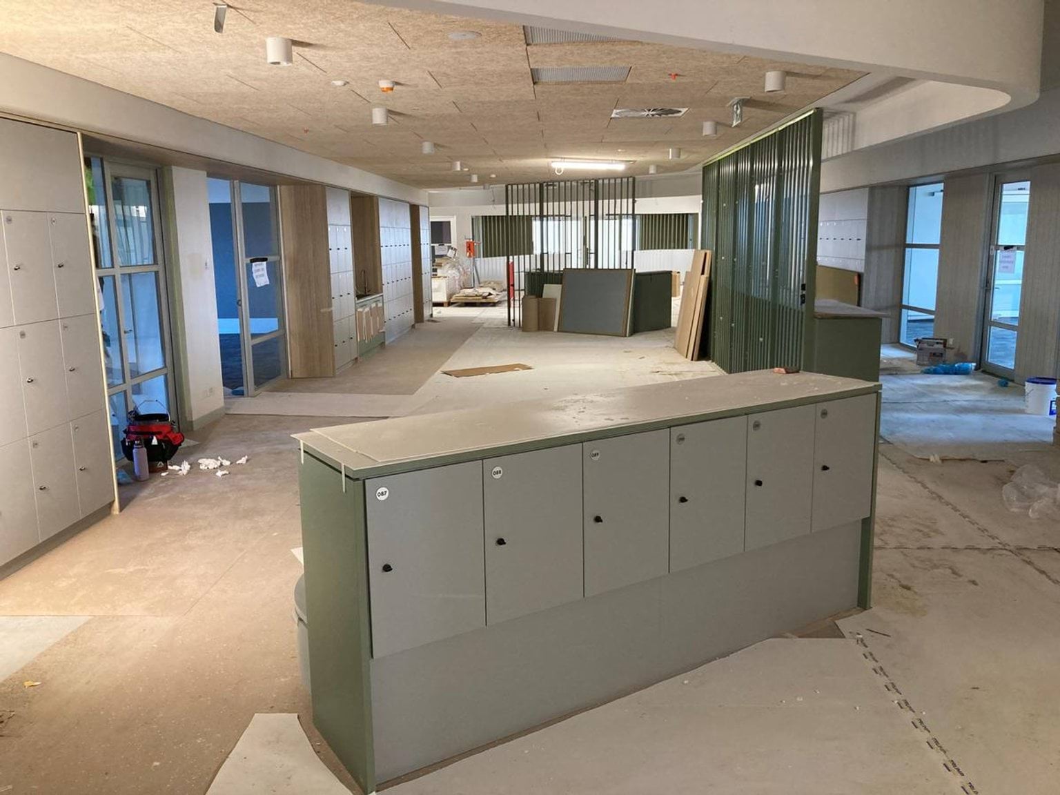 School room under construction with lockers in foreground